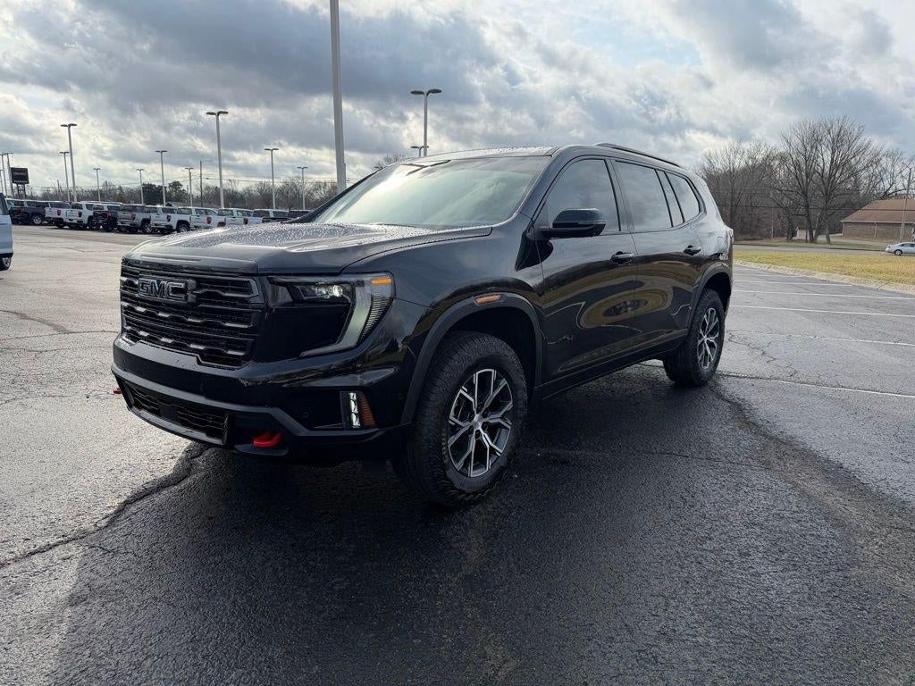 2026 GMC Acadia AT4 in Ebony Twilight Metallic — front three-quarter view