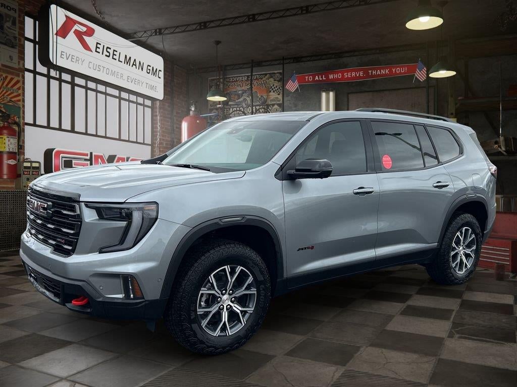 2026 GMC Acadia AT4 in Sterling Metallic — front three-quarter view