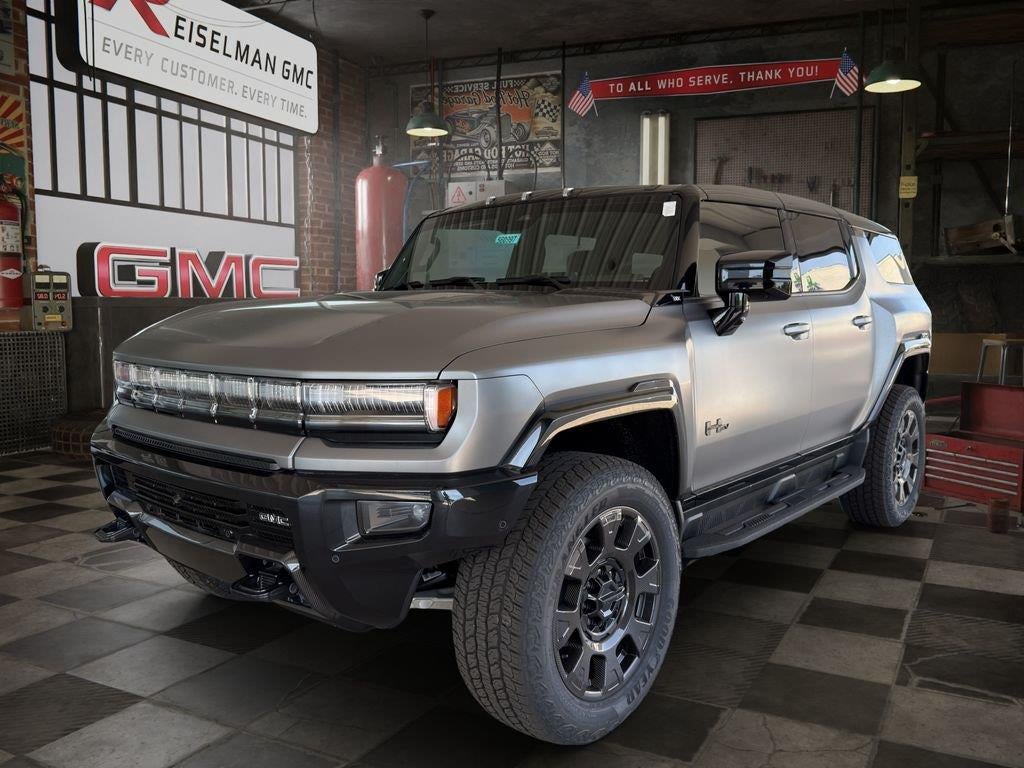 2026 GMC HUMMER EV SUV 3X in Magnus Gray Matte — front three-quarter view
