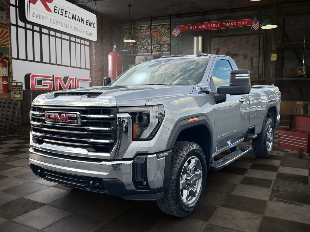 2026 GMC Sierra 3500 HD SLE in Sterling Metallic — front three-quarter view
