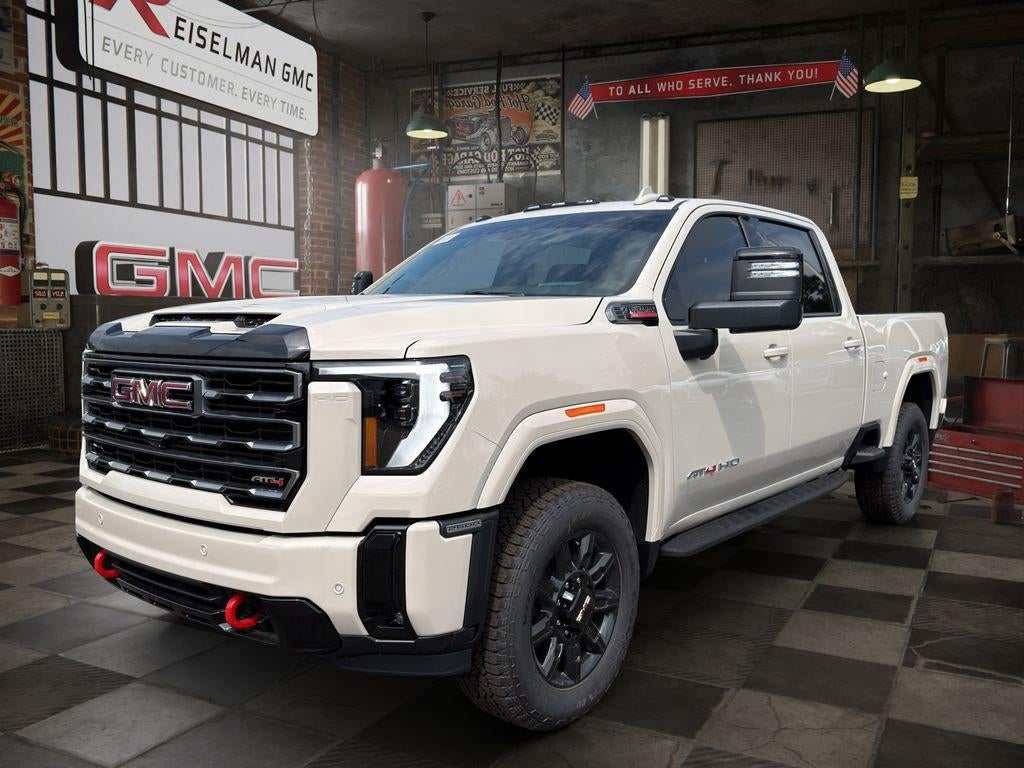 2026 GMC Sierra 2500 HD AT4 in Coastal Dune — front three-quarter view