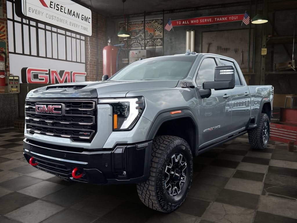 2026 GMC Sierra 2500 HD AT4X in Sterling Metallic — front three-quarter view