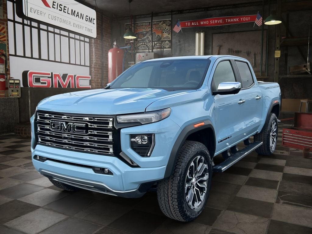 2026 GMC Canyon Denali in Glacier Metallic — front three-quarter view