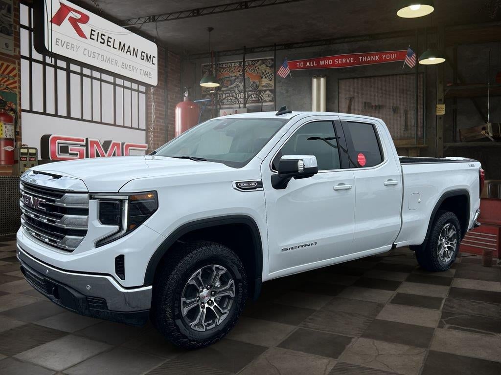 2026 GMC Sierra 1500 SLE in Summit White — front three-quarter view