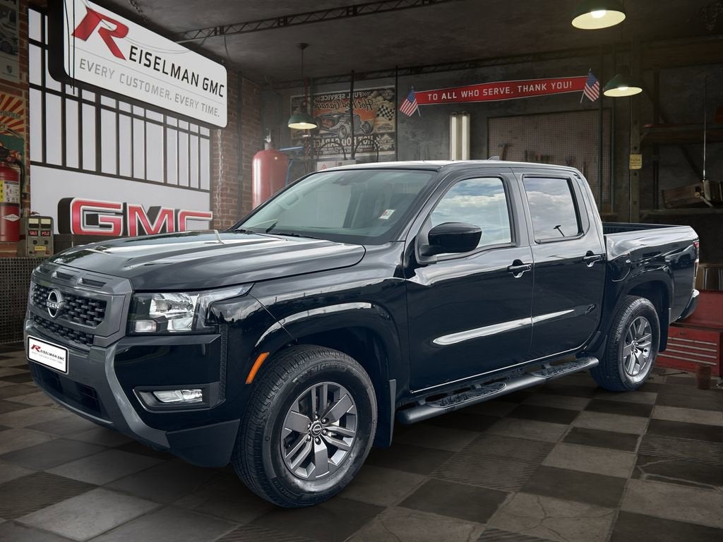 2025 Nissan Frontier Crew Cab SV 4x2 in Black — front three-quarter view