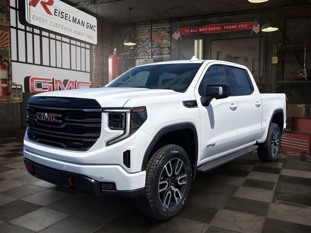 2026 GMC Sierra 1500 AT4 in Summit White — front three-quarter view
