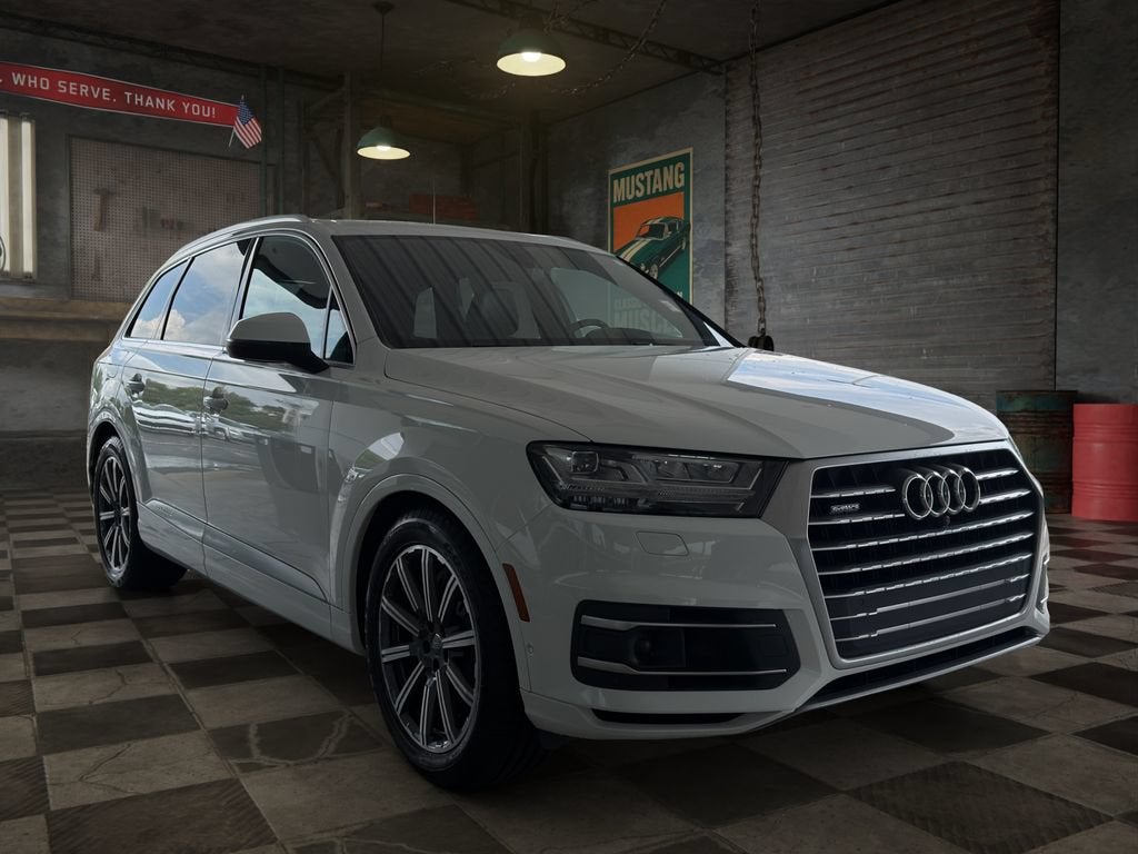 2019 Audi Q7 55 Premium in White — front three-quarter view