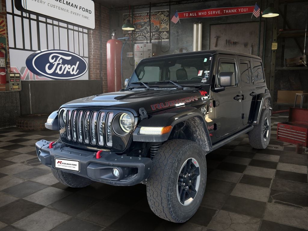 2019 Jeep Wrangler Unlimited Rubicon in Black Clearcoat — front three-quarter view