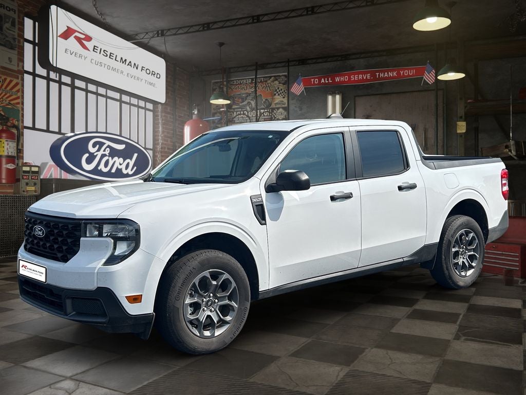 2025 Ford Maverick XLT in Oxford White — front three-quarter view