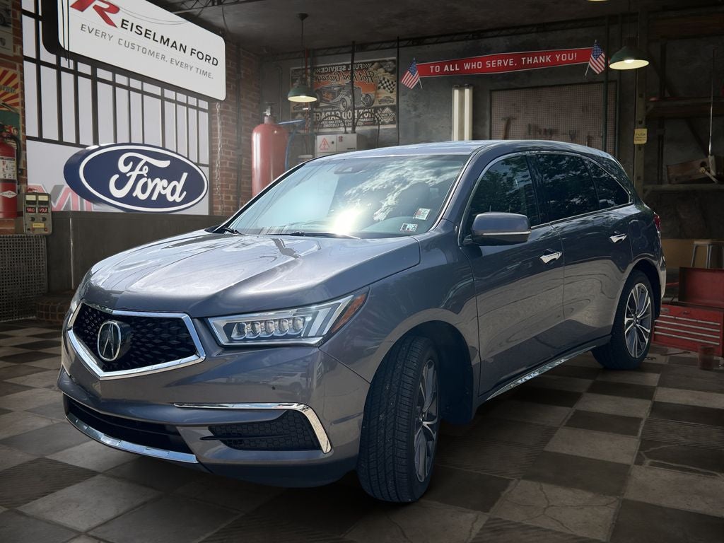2019 Acura MDX 3.5L Technology Package SH-AWD in Modern Steel Metallic — front three-quarter view