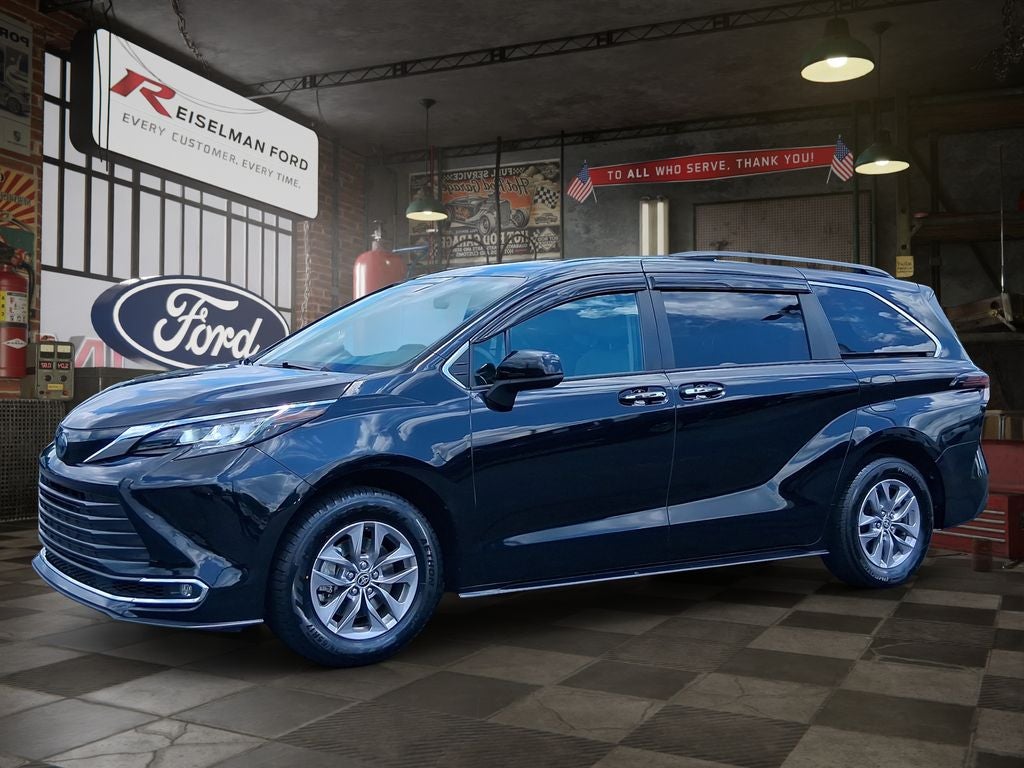2023 Toyota Sienna XLE 8 Passenger in Midnight Black Metallic — front three-quarter view