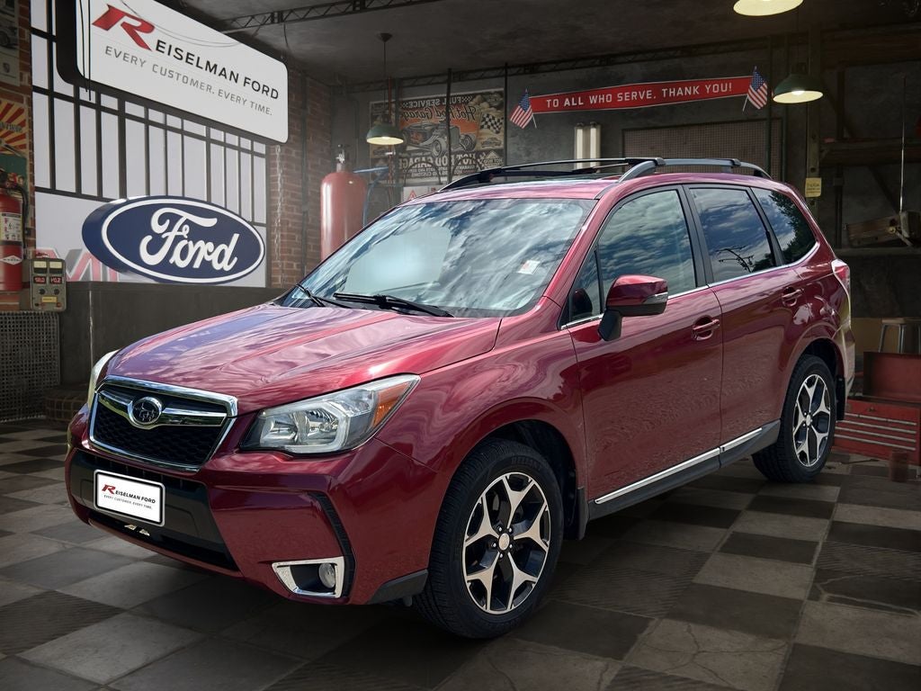 2015 Subaru Forester 2.0XT Touring in Venetian Red Pearl — front three-quarter view