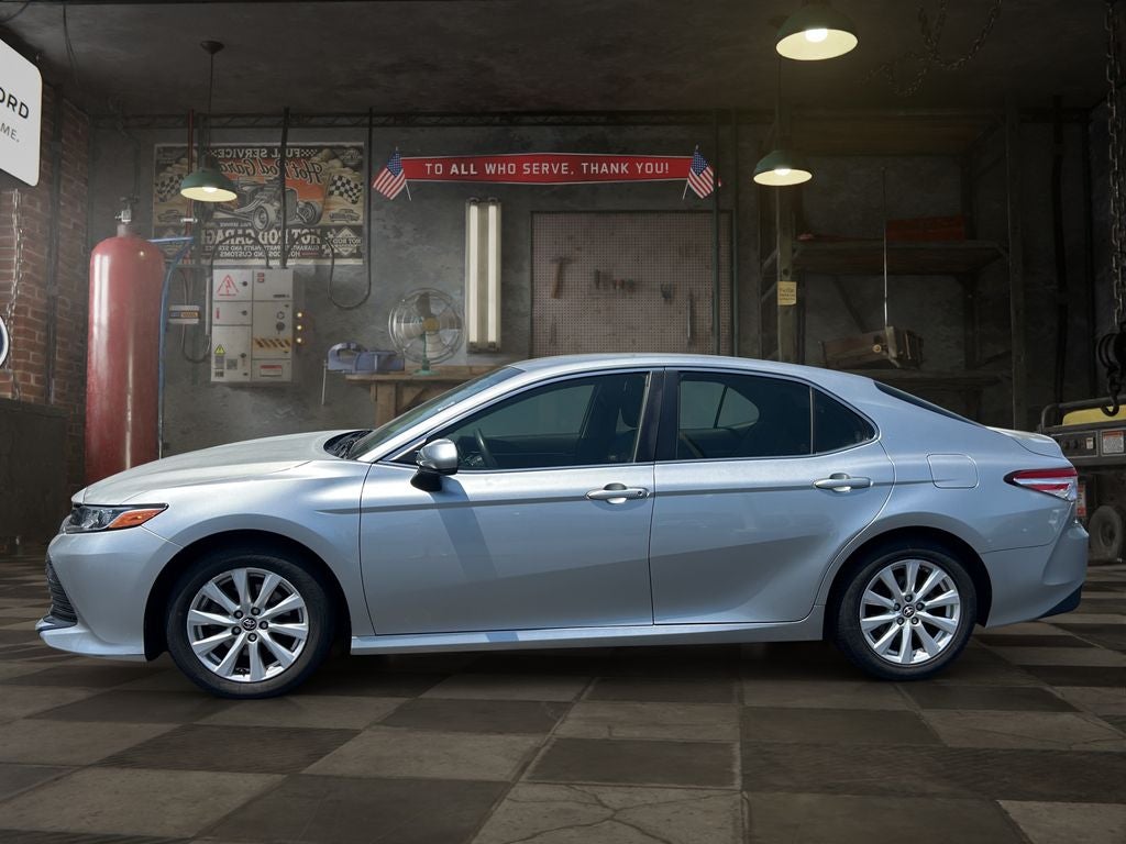 2018 Toyota Camry — rear three-quarter view